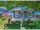 Charming single story home with well-kept front yard, patio and an American flag at 2791 Quarterland St, Strasburg, CO 80136