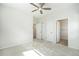 Spacious bedroom featuring carpet, natural light and walk-in closet at 11873 W 51St Ave, Wheat Ridge, CO 80033