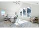 Bright and airy main bedroom with vaulted ceilings and large windows at 11873 W 51St Ave, Wheat Ridge, CO 80033