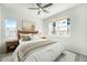 Comfortable bedroom with a large window and stylish decor at 11873 W 51St Ave, Wheat Ridge, CO 80033