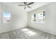 Bright and airy bedroom with natural light and neutral tones at 11873 W 51St Ave, Wheat Ridge, CO 80033