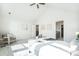 Bedroom featuring carpet, ceiling fan and natural light at 11873 W 51St Ave, Wheat Ridge, CO 80033