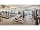 Well-equipped fitness center featuring a variety of exercise machines and mirrored walls at 1390 N Emerson St # 407, Denver, CO 80218