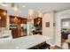 Spacious kitchen featuring an island with bar seating and stainless steel appliances at 1023 S High St, Denver, CO 80209