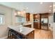 Modern kitchen with quartz countertops, stainless steel appliances, and pendant lighting at 1023 S High St, Denver, CO 80209