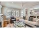 Inviting living room showcasing natural light and hardwood floors at 1023 S High St, Denver, CO 80209