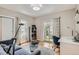 Comfortable home office featuring natural light and backyard access at 1023 S High St, Denver, CO 80209
