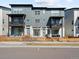 Contemporary townhome exterior showcasing stylish architecture, private balconies, and street view at 2721 W 167Th Pl, Broomfield, CO 80023