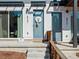 Inviting entrance with dual front doors, modern accents, and a welcoming wreath at 2721 W 167Th Pl, Broomfield, CO 80023