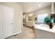 Spacious bathroom featuring double vanity, soaking tub with tile surround, and glass shower at 16113 Enchanted Peak Way, Monument, CO 80132