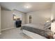 Bedroom featuring carpeted floors, a window with blinds, and walk-in closet at 16113 Enchanted Peak Way, Monument, CO 80132