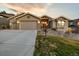 Home exterior with a three car garage, and craftsman details at 16113 Enchanted Peak Way, Monument, CO 80132