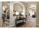 Beautiful Foyer with archways to other rooms, hardwood floors and natural light at 16113 Enchanted Peak Way, Monument, CO 80132