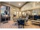 Lovely outdoor patio featuring a grill and comfortable seating, perfect for entertaining guests at 16113 Enchanted Peak Way, Monument, CO 80132