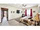 Spacious main bedroom featuring a relaxing sitting area and an en-suite bathroom at 30041 Marys Dr, Conifer, CO 80433