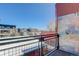 Balcony view of neighborhood featuring rooftop views and vibrant blue sky at 3040 Zuni St # F, Denver, CO 80211