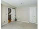 Spacious bedroom with great lighting, two closets, and neutral carpet at 3040 Zuni St # F, Denver, CO 80211