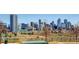 Expansive city view featuring the Denver skyline and bridges over the Platte River at 3040 Zuni St # F, Denver, CO 80211
