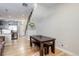 Bright dining area features a modern table and chair set, adjacent to kitchen at 3040 Zuni St # F, Denver, CO 80211