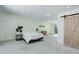 Spacious main bedroom featuring neutral decor, with natural light, and carpeted floors at 3040 Zuni St # F, Denver, CO 80211