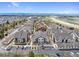 Scenic aerial view of community with parking, manicured landscaping, and nearby amenities in a great location at 4500 Copeland Cir # 104, Highlands Ranch, CO 80126