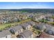 Overhead view of community situated in established neighborhood, showcasing green spaces, parking, and residential charm at 4500 Copeland Cir # 104, Highlands Ranch, CO 80126