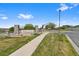 Stone entrance sign for Shadow Canyon, set against a bright blue sky at 4500 Copeland Cir # 104, Highlands Ranch, CO 80126