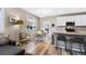 Inviting dining area with views to the kitchen, perfect for enjoying meals with Gathering and friends at 4500 Copeland Cir # 104, Highlands Ranch, CO 80126