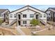 Attractive two-story condo with stairs and a landscaped yard at 4500 Copeland Cir # 104, Highlands Ranch, CO 80126