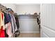 Spacious walk-in closet with ample shelving, offering generous storage for clothing and personal items at 4500 Copeland Cir # 104, Highlands Ranch, CO 80126