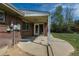 Covered patio area with access to the backyard, providing a great space for outdoor living and entertaining at 2120 S Ouray St, Aurora, CO 80013