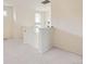 Upstairs landing area, offering an open and airy feel with neutral carpeting and white railing at 10136 Worchester St, Commerce City, CO 80022