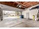 An open garage with a view of the neighborhood street and surrounding homes at 10720 Moore Cir, Westminster, CO 80021