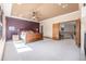 Spacious main bedroom with walk out access, large ceilings, sitting area, and connected main bathroom at 6722 S Wolff Ct, Littleton, CO 80128