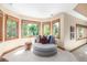 Cozy sitting area with natural light and beautiful views of the outdoors at 6722 S Wolff Ct, Littleton, CO 80128