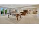 Finished basement with a pool table, recessed lighting, and an open floor plan at 5424 Hacienda Pl, Parker, CO 80134