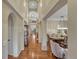 Stunning foyer with soaring ceilings and elegant architectural details at 5424 Hacienda Pl, Parker, CO 80134