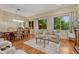 Inviting living room with dining area and large windows offering scenic views at 5424 Hacienda Pl, Parker, CO 80134