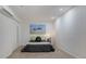 Neutral carpeted bedroom featuring a picture window and closet at 315 Arapahoe Ave # 202, Boulder, CO 80302