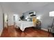 Serene bedroom with hardwood floors, a comfortable bed, and stylish accents at 315 Arapahoe Ave # 202, Boulder, CO 80302