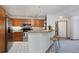 Efficient kitchen with stainless steel appliances, breakfast bar, and modern lighting at 315 Arapahoe Ave # 202, Boulder, CO 80302