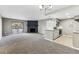 Spacious living room with stylish fireplace and sliding door to balcony at 18004 E Ohio Ave # 101, Aurora, CO 80017