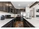 Modern kitchen with stainless steel appliances and white countertops at 11740 W 45Th Pl, Wheat Ridge, CO 80033