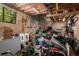 Unfinished basement with exposed wood beams and a work area presents potential for improvement at 3116 S Lincoln St, Englewood, CO 80113