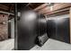 Unfinished basement area with blacked out walls and ceiling showing customization potential at 3116 S Lincoln St, Englewood, CO 80113