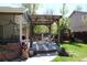 Charming back porch featuring pergola and comfortable seating area at 8101 S San Juan Range Rd, Littleton, CO 80127