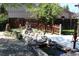 Landscaped backyard with a rock water feature and a wooden fence at 8101 S San Juan Range Rd, Littleton, CO 80127
