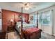 Cozy bedroom with four-poster bed, soft lighting, and a warm, inviting atmosphere at 8101 S San Juan Range Rd, Littleton, CO 80127