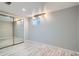A spacious bedroom featuring a mirrored closet and ample room at 8101 S San Juan Range Rd, Littleton, CO 80127