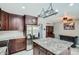 Spacious kitchen features granite countertops, stainless steel appliances, and a large island at 8101 S San Juan Range Rd, Littleton, CO 80127